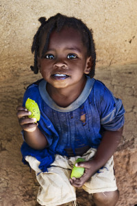 Kenya, Nyanza Province, Maseno. February 18, 2010 Three year old Esnas Savai is the daughter of Jane Ambasa, who is currently a beneficiary of the WFPÕs Mother and Child Health programme in Maseno. Jane, who prior to receiving food aid from the programme was weak and unable to produce enough milk to feed her newborn baby, now receives CSB blend porridge along with advice on how to cook and look after herself, Esnas and her two other children ages 9, and 2 months old. Photo: WFP/Rein Skullerud