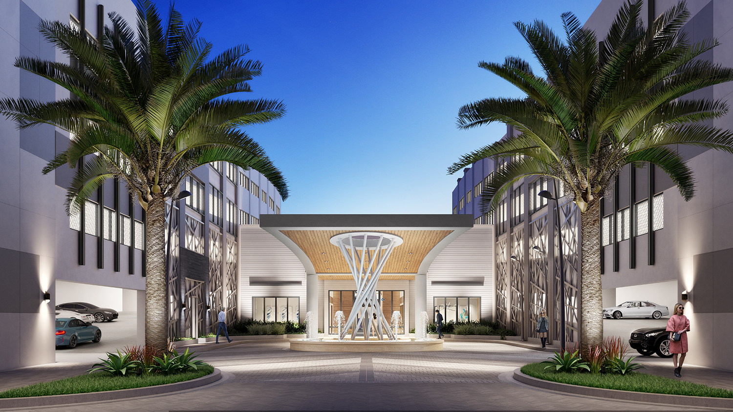 Modern luxury hotel entrance framed by palm trees under a clear blue sky.