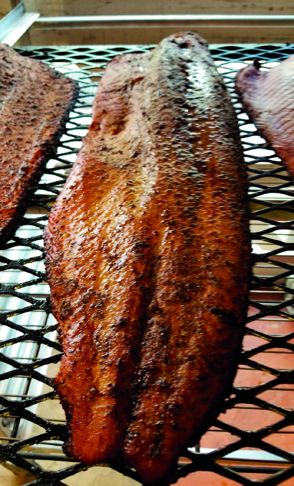 Mrs. Peters smoked fish filet on a smoking rack