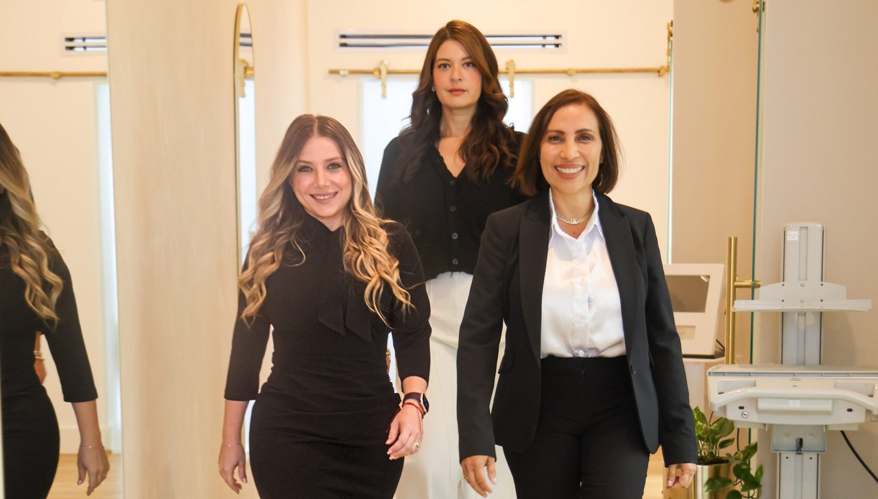 Medilight founders Nathaly Gerbino, Jennifer Reimi and Niurka Gomez walking through the Coral Gables clinic