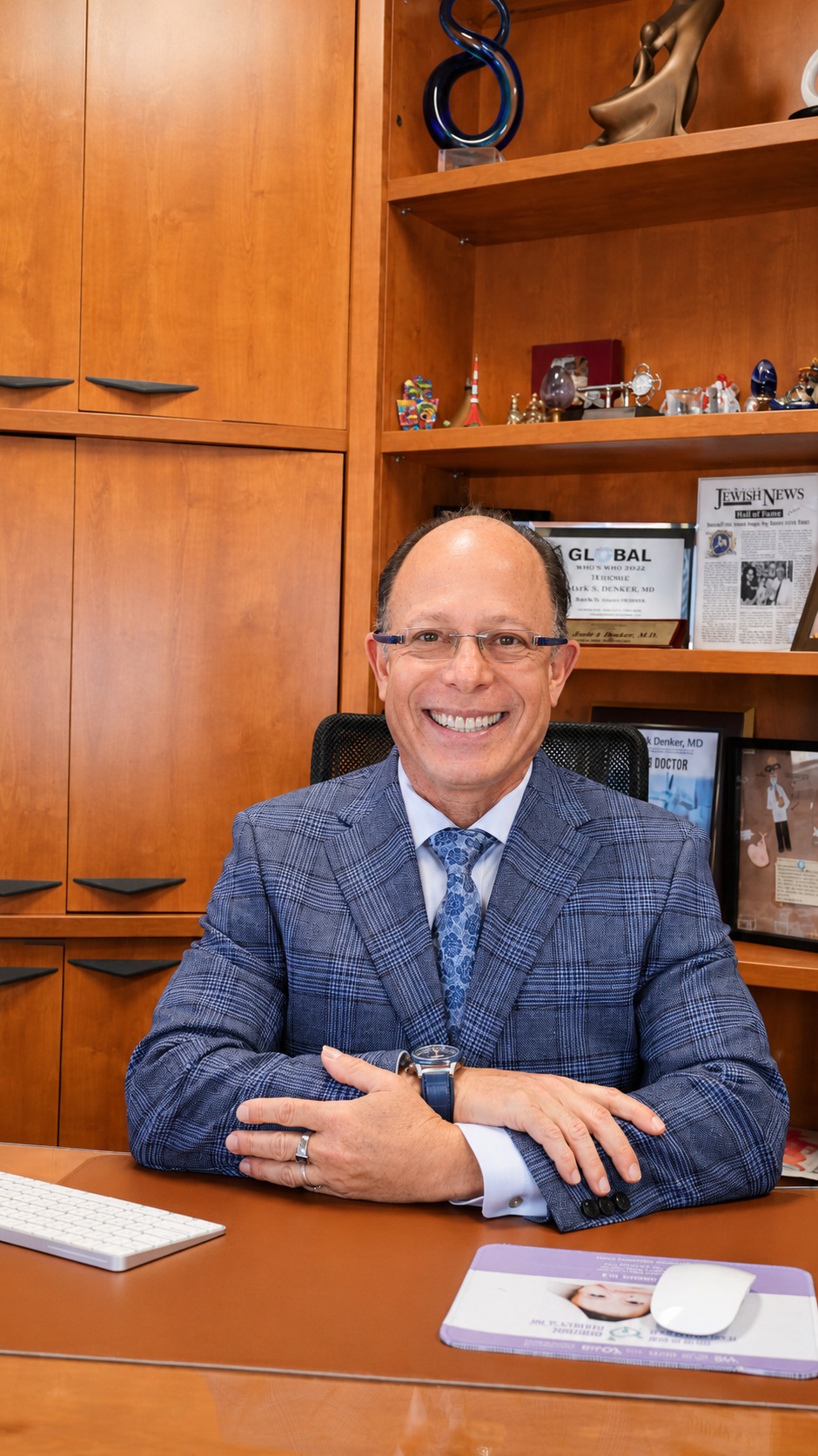 Dr. Mark S. Denker at his desk