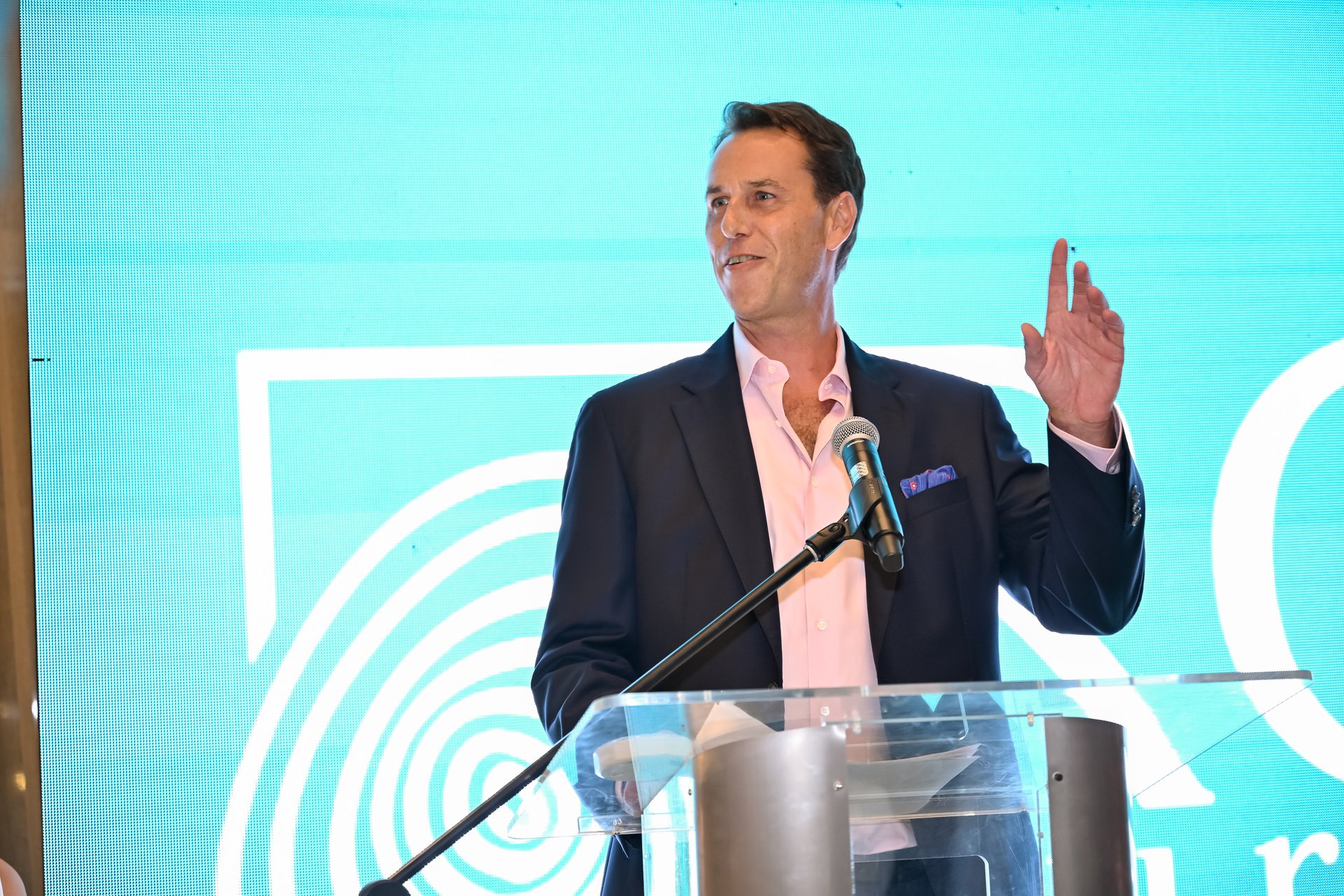 Santiago Agardy, CEO USA & Co-Founder of RGS Europe USA, addresses guests at the Coral Gables flagship opening