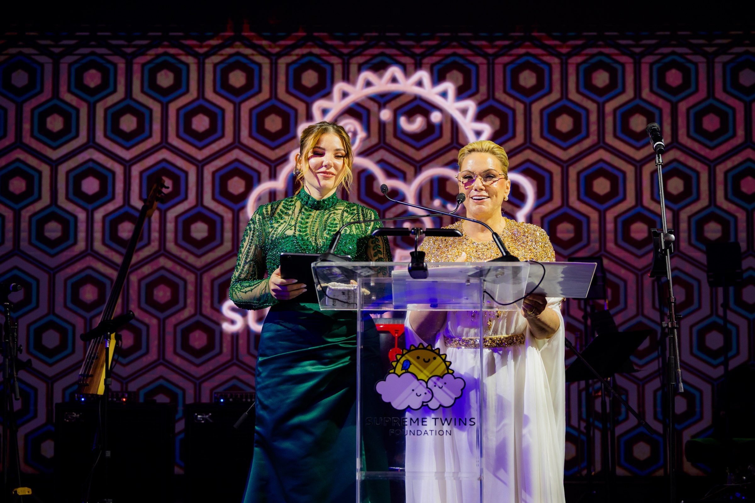 Presenters on stage at the Supreme Twins Foundation 2nd Annual Gala