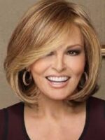 Smiling woman with styled blonde hair and hoop earrings.
