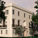 Elegant two-story beige building with classic balconies and large windows.