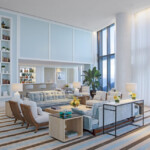 Bright and modern living room with large windows and comfortable seating.