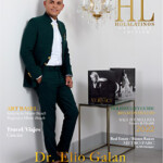 Dr. Elio Galan in a stylish green suit posing for HL Magazine cover.
