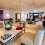 Elegant, modern living room with cream tones and stylish decor.