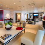 Elegant, modern living room with cream tones and stylish decor.