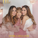 Three women smiling warmly at a celebratory event with soft pink decor.