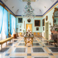 Elegant room with chandelier and classic decor.