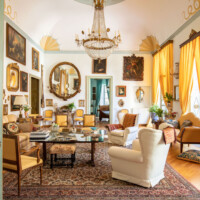 Luxurious classical living room with elegant furniture and art.