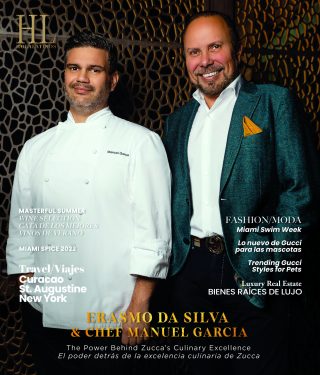 Los chefs Eduardo Da Silva y Charles Neel Garcia posan con confianza en atuendo profesional.