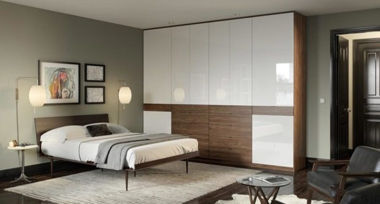 Modern bedroom with neutral tones and minimalist design.